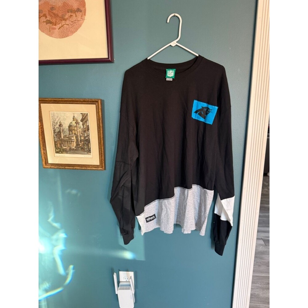 NFL Black Long Sleeve Tee with Carolina Panthers Logo and Gray Hem